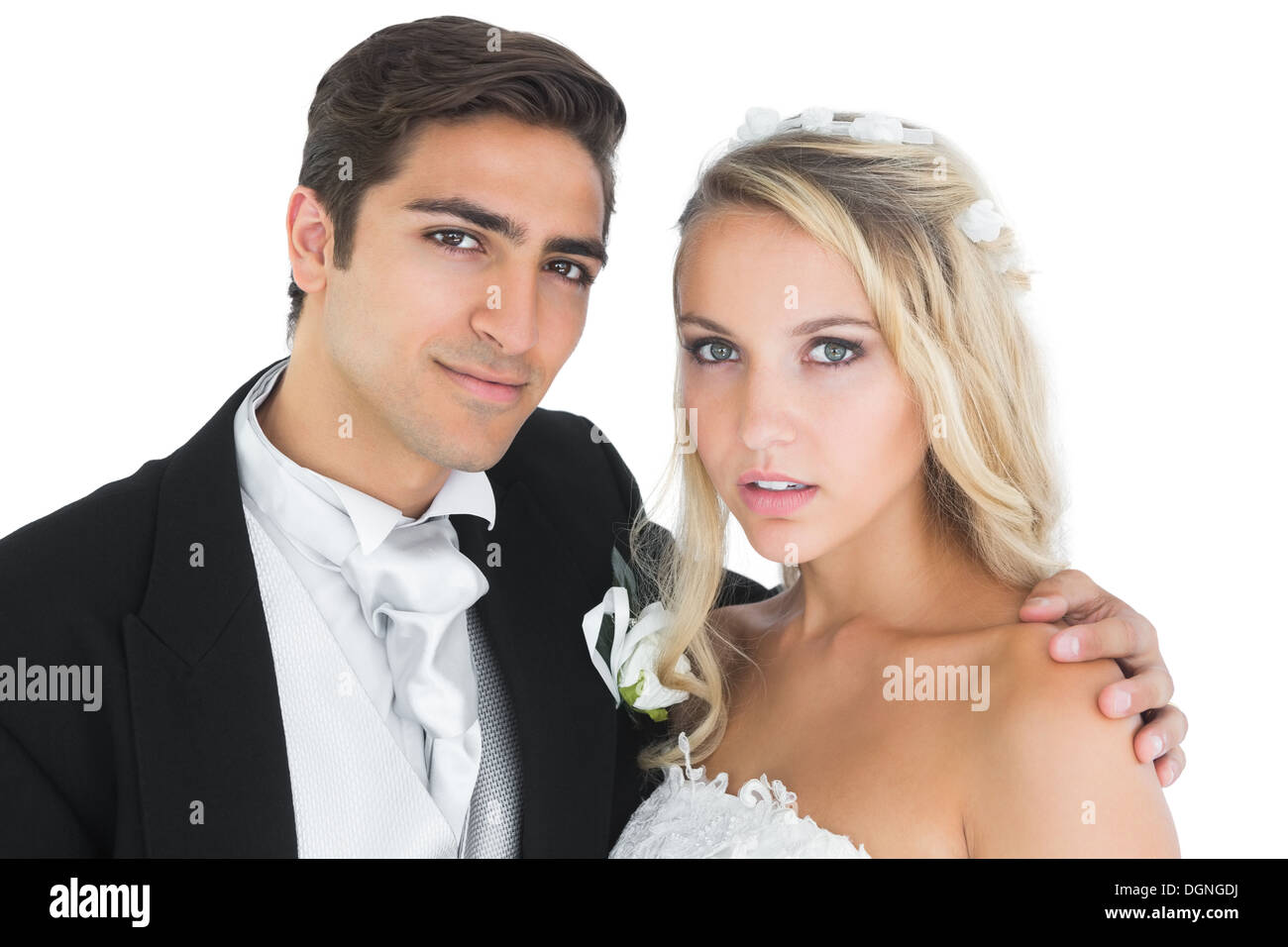 Young bridegroom posing with his wife Stock Photo