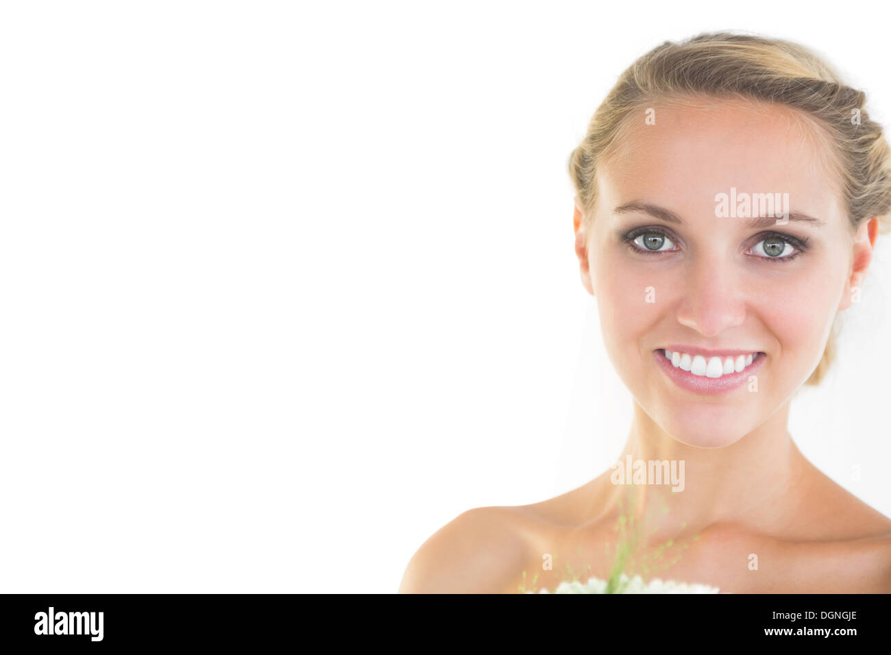 Beautiful young bride smiling at camera Stock Photo