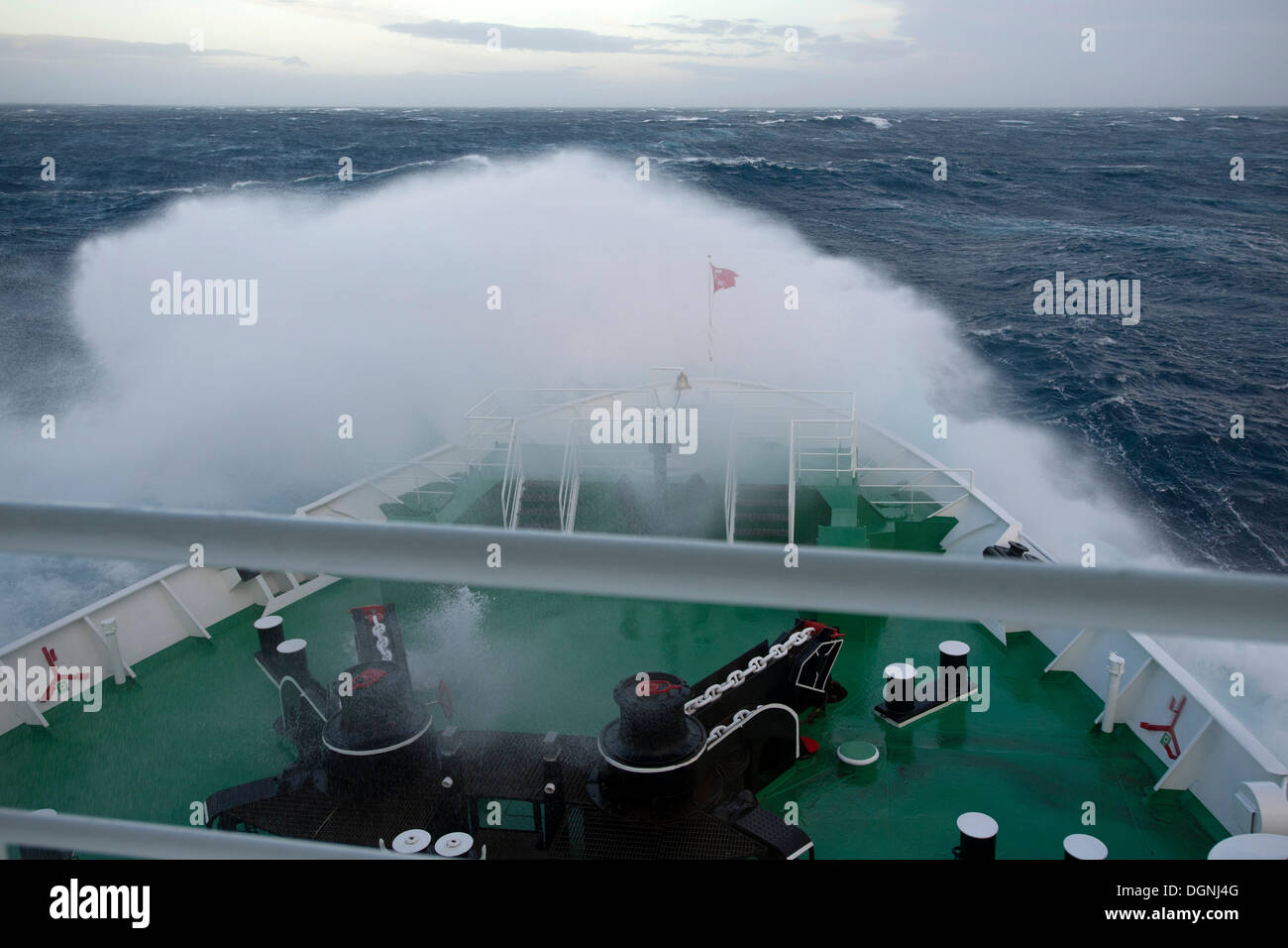 Crossing of the Drake Passage, a big wave is breaking over the bow of the MS Expedition, expedition cruise ship, Atlantic Ocean Stock Photo