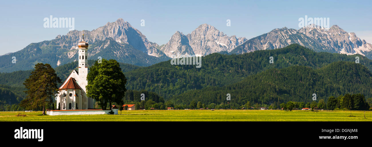 Baroque Church of St. Coloman in front of the Tannheim Mountains ...