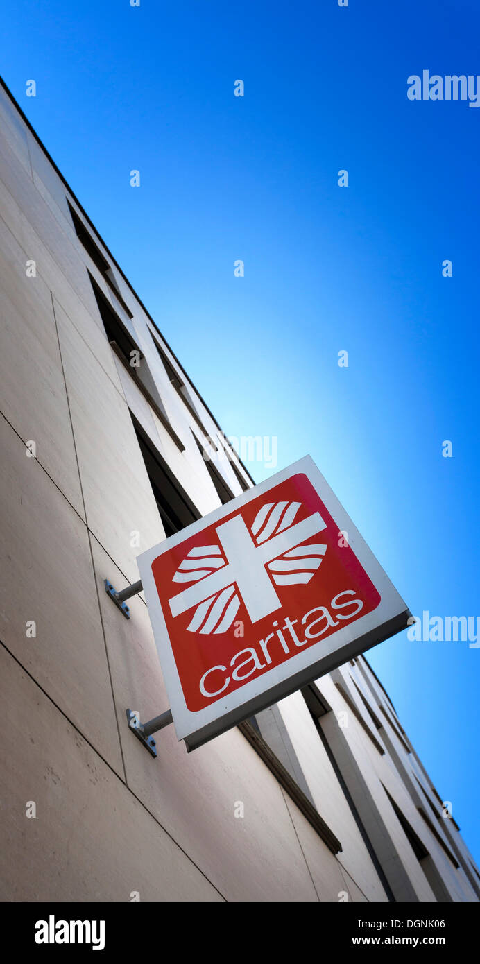 Sign, logo of the 'Caritas' charity, Berlin-Mitte, Berlin Stock Photo