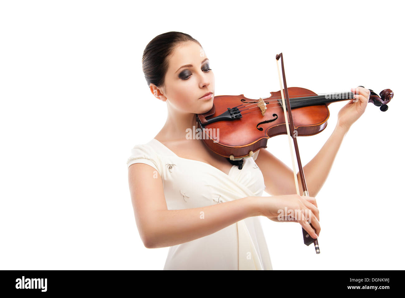 Beautiful young woman playing violin over white Stock Photo - Alamy