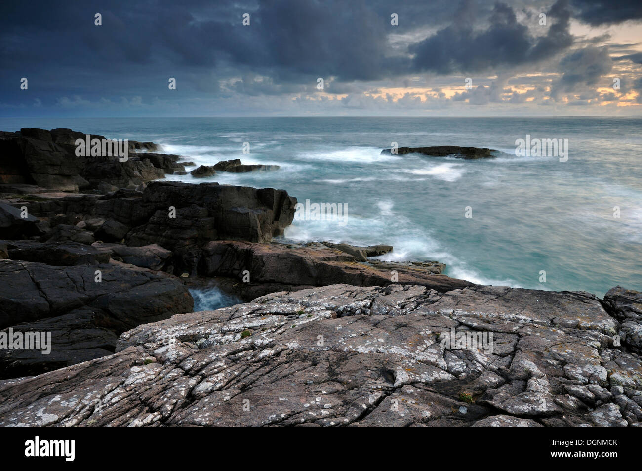 Coastal cliffs and rocks of the Atlantic Ocean in the evening, Northern Highlands, Highlands