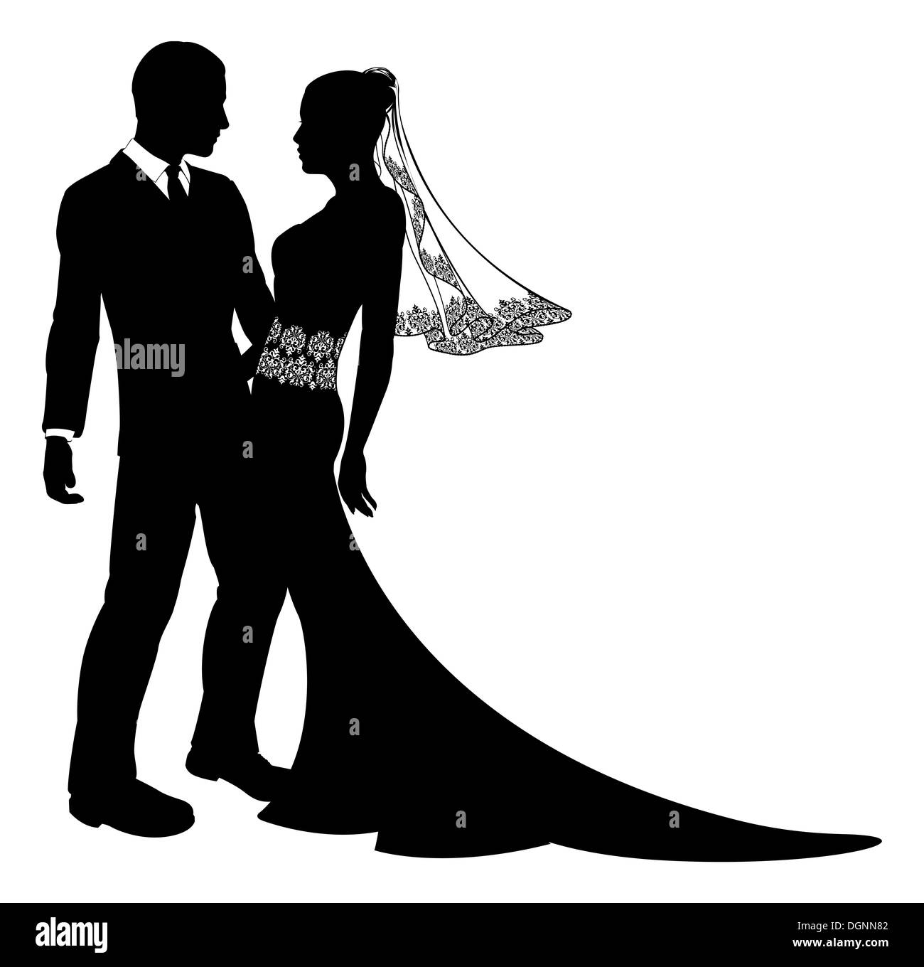 A bride and groom wedding couple in silhouette with beautiful bridal dress with veil and lace abstract floral pattern. Stock Photo