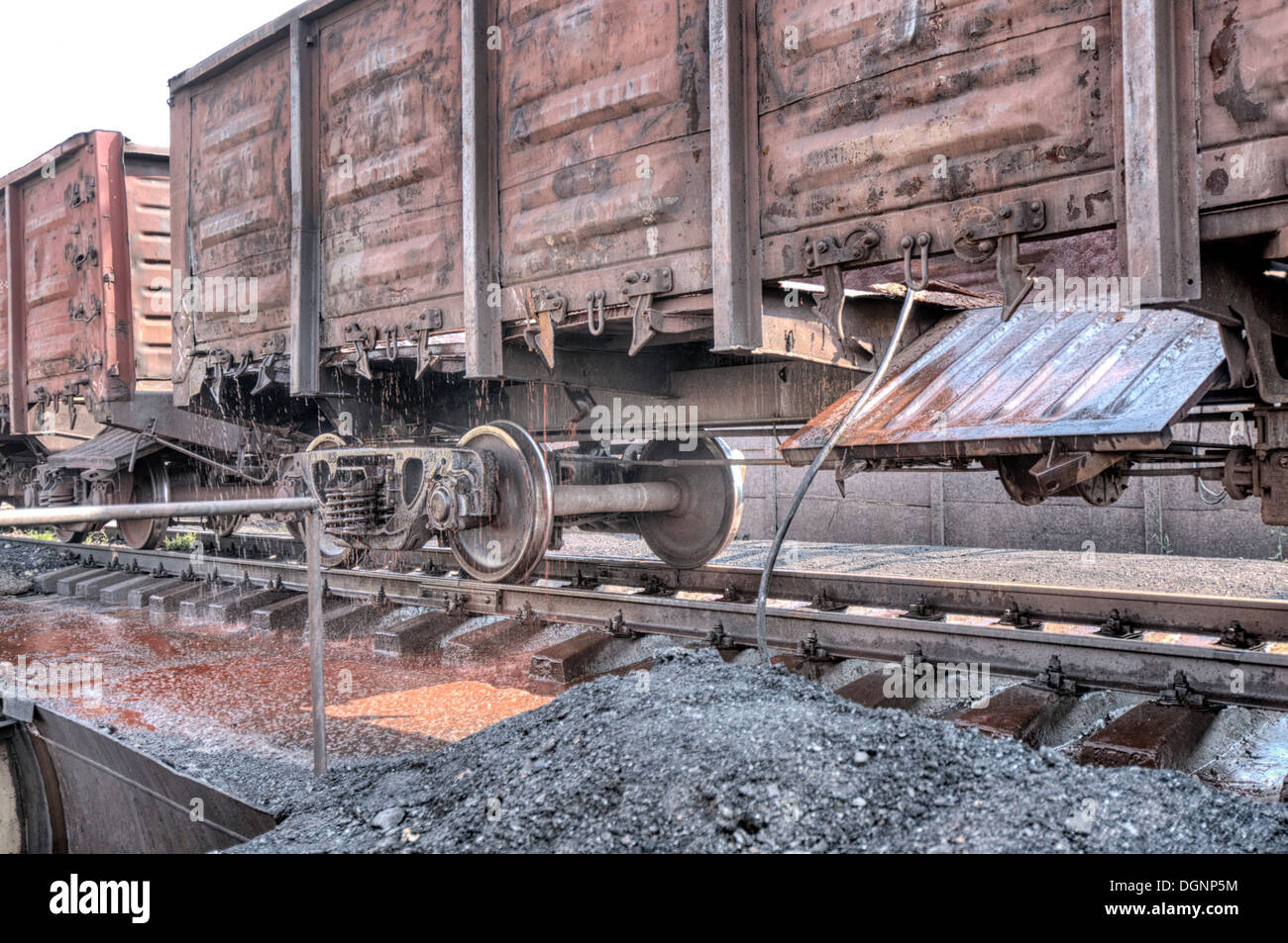 A long line of boxcars cleaned of debris Stock Photo