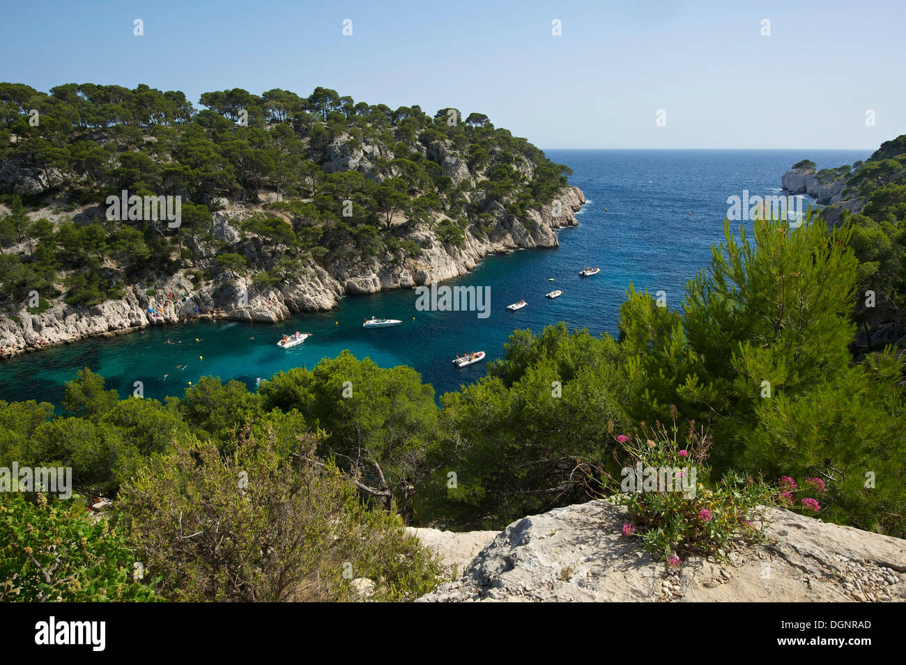 Boats in the rocky bay Calanque de Port-Pin, Calanques National Park ...