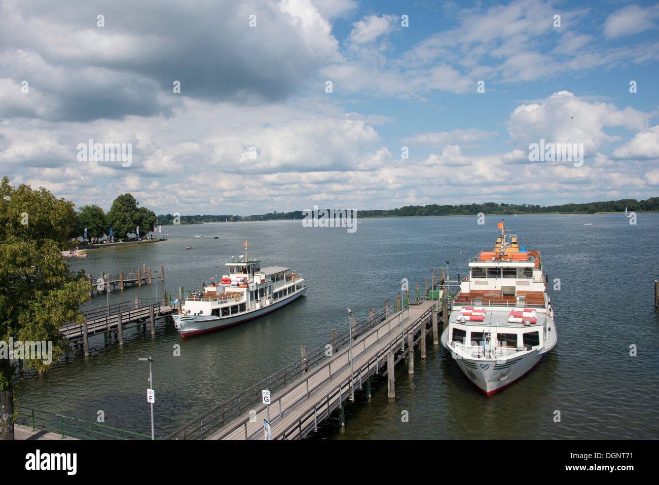 A steamboat at a landing stage on lake Chiemsee, Insel Herrenchiemsee, Prien am Chiemsee, Bavaria, Germany Stock Photo