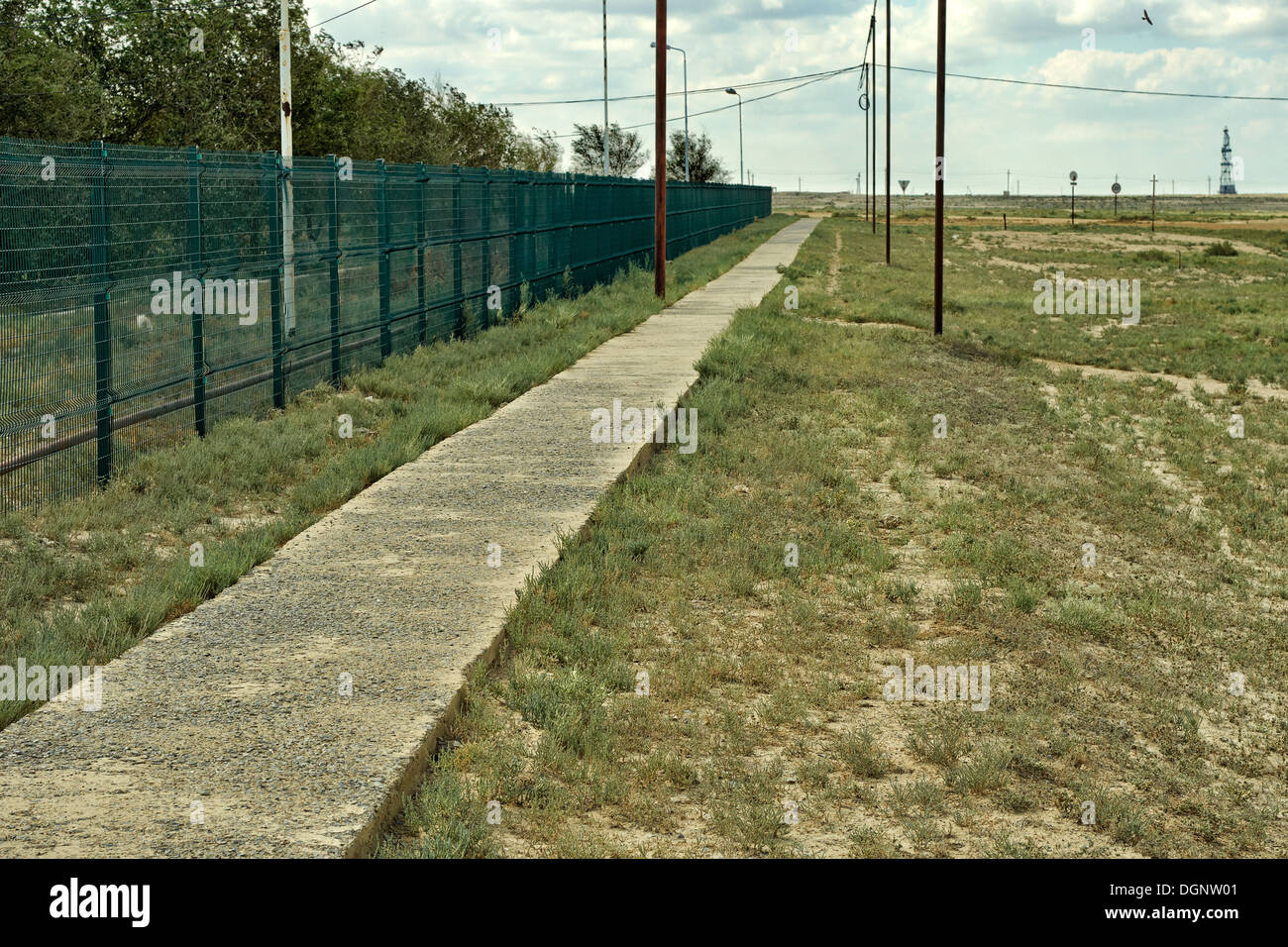 concrete, grass, green, cement, path, sidewalk, walkway, pavement, perspective, walk, footpath, pathway, rough, simplicity, text Stock Photo