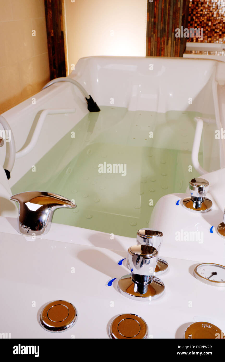 Jacuzzi Spa Bathtub in a marble bathroom Stock Photo - Alamy