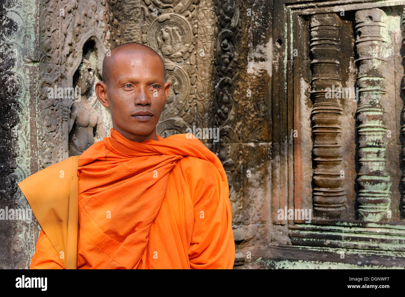 Buddhist monk in the Ta Prohm Temple, Cambodia, Southeast Asia, Asia Stock Photo