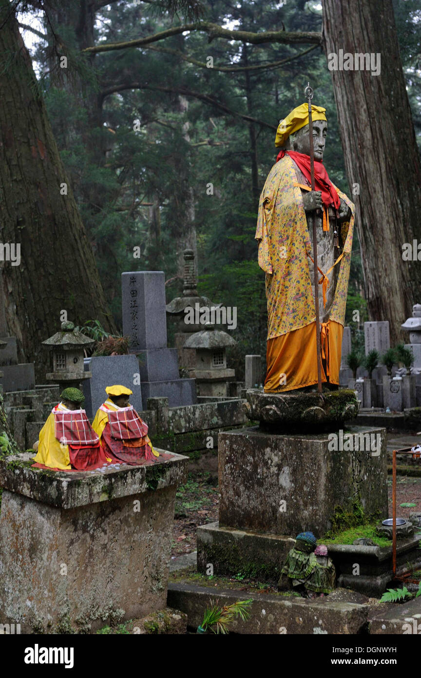 Jiz&#333; statue, the guardian of deceased children as well as miscarried, stillborn, and aborted fetuses, in the cemetery of Stock Photo