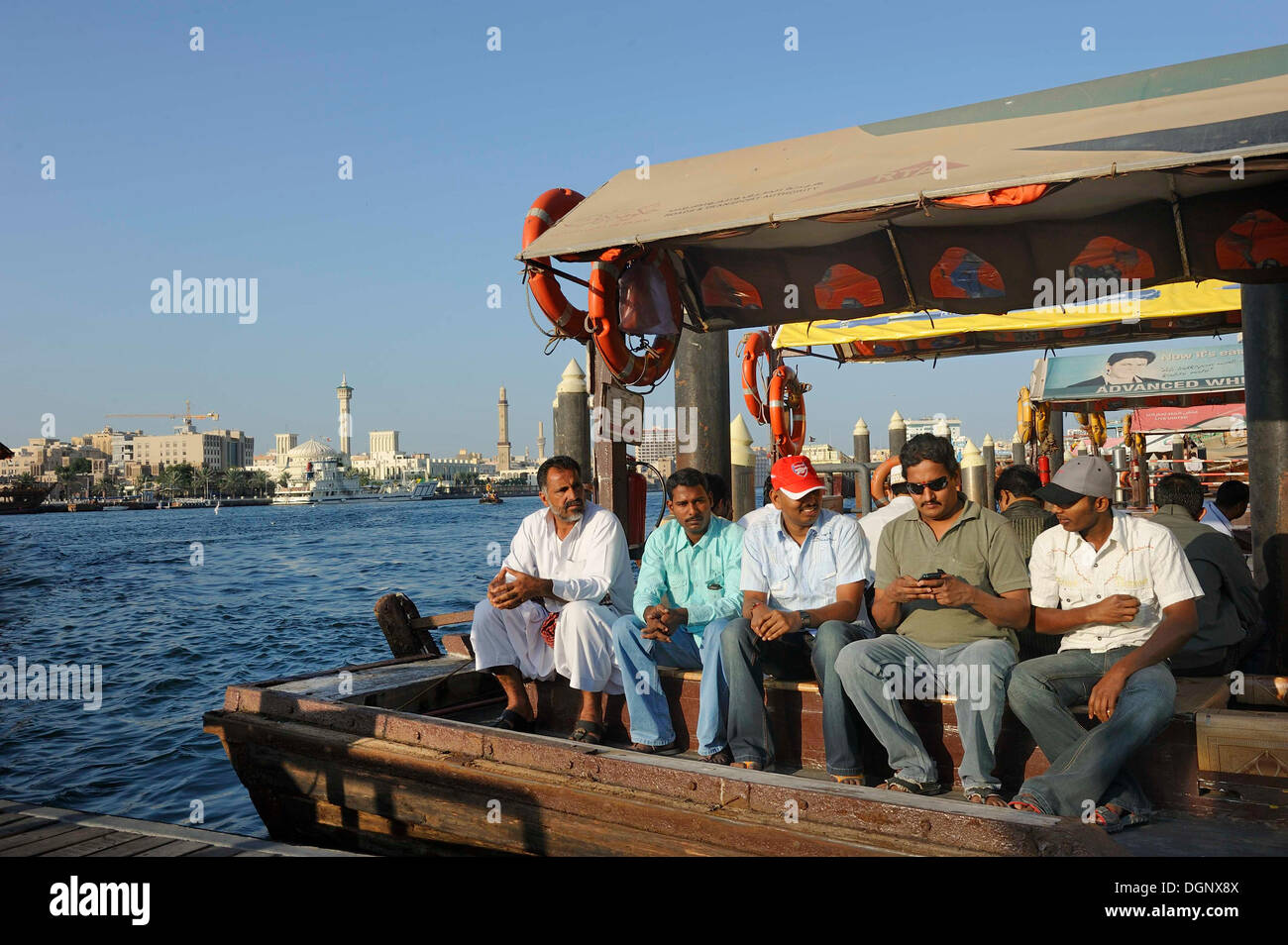 Man sitting on boat dubai hi-res stock photography and images - Alamy
