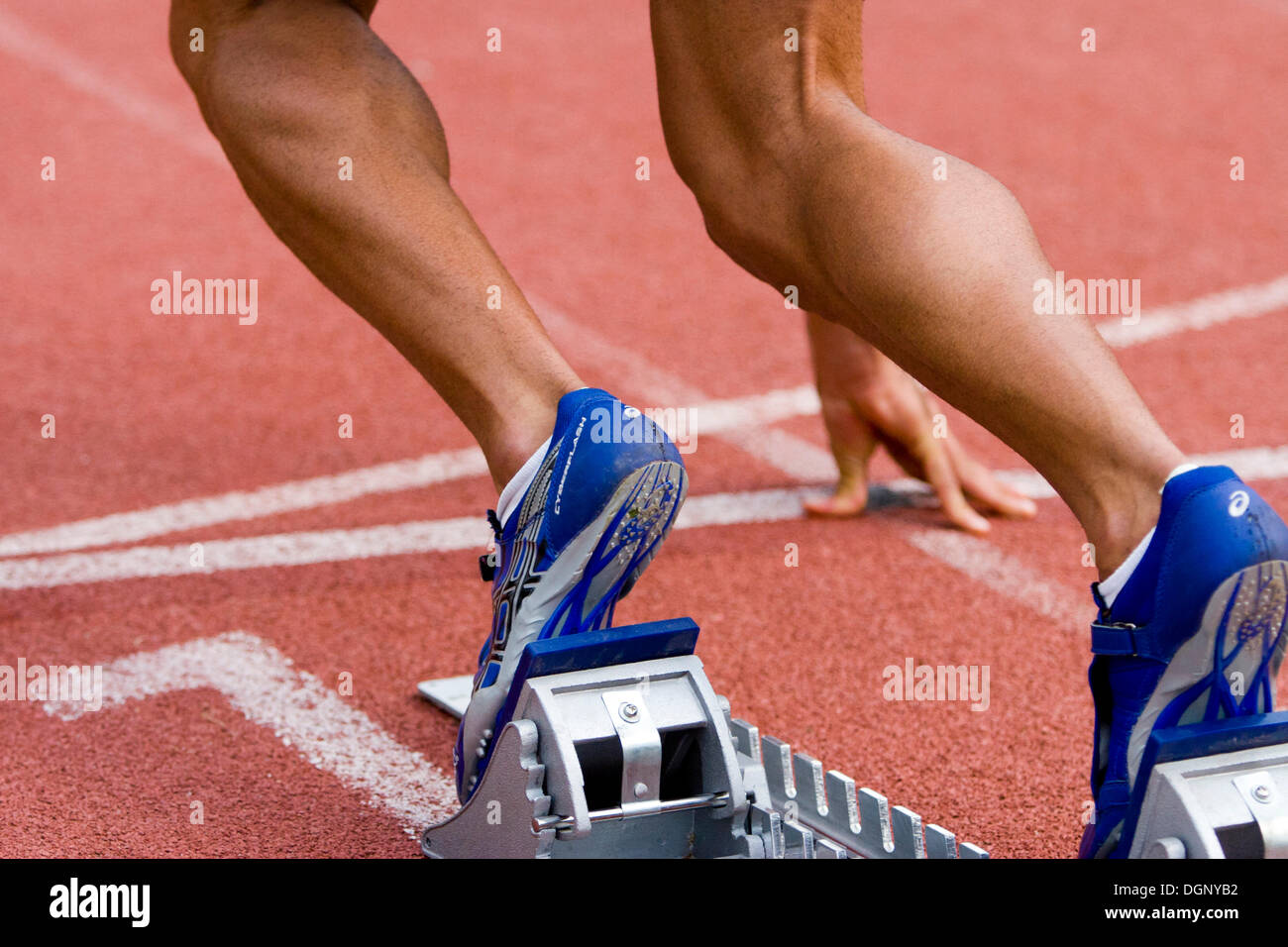 Start block, hundred meter run, detail of the feet Stock Photo Alamy