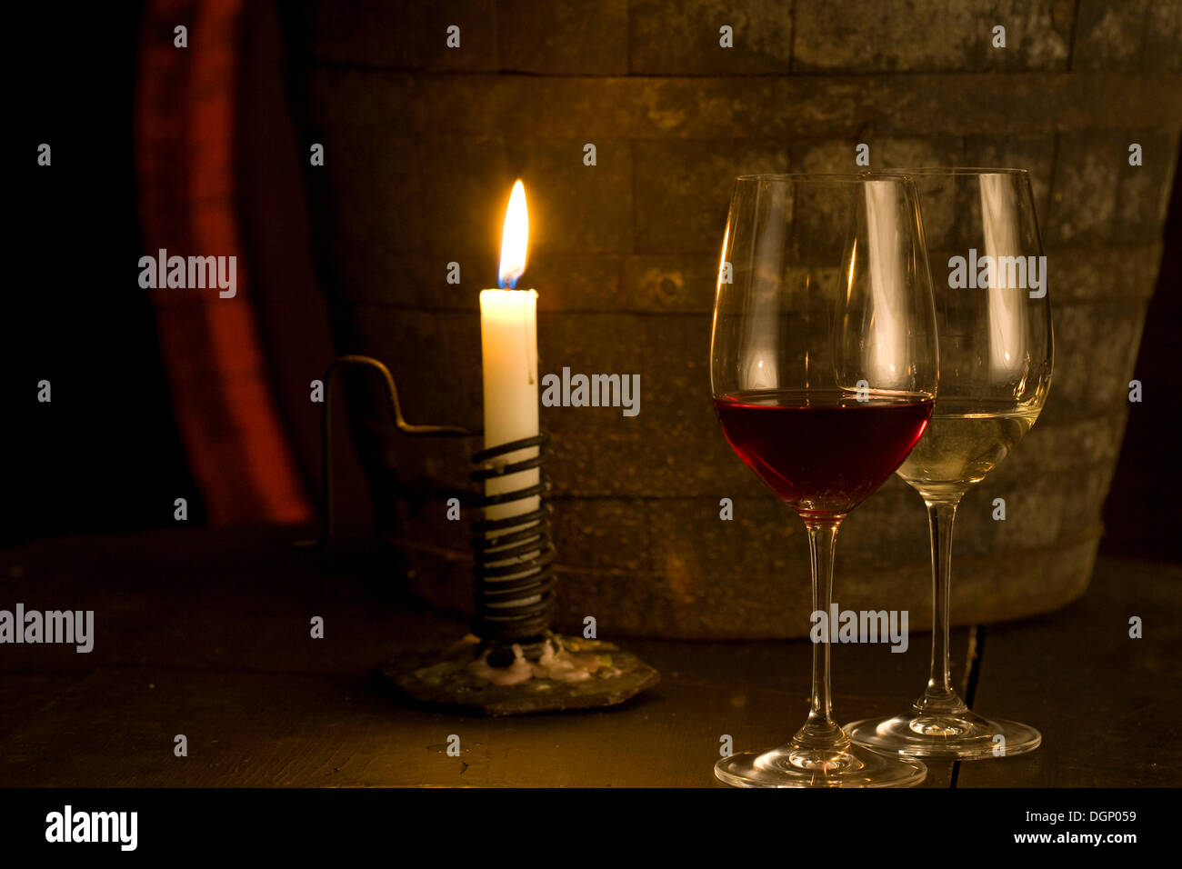 Wine glasses, burning candle Stock Photo Alamy