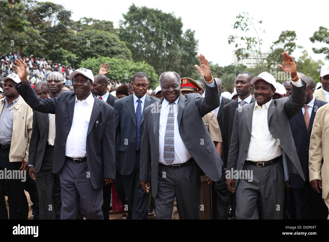 President Mwai Kibaki (center) Prime Minister Raila Odinga(left) with Vice President Kalonzo (right) lead thousands during Stock Photo