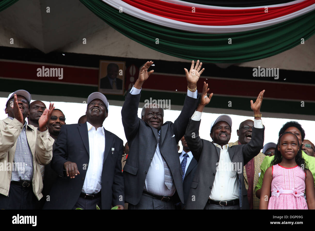 President Mwai Kibaki (center) Prime Minister Raila Odinga(left) with Vice President Kalonzo (right) lead thousands during Stock Photo