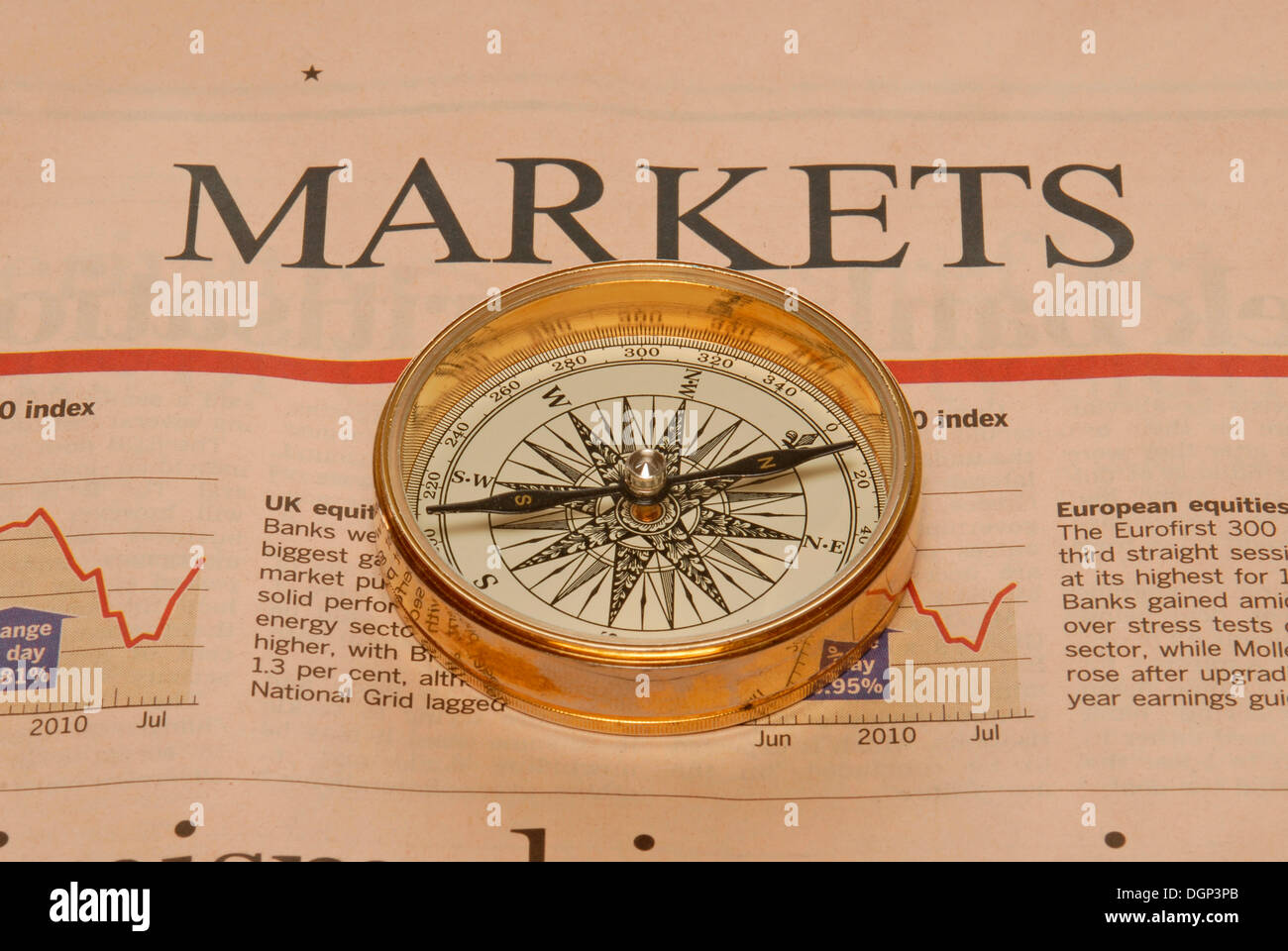 Compass on business newspaper, symbolic image for American economy Stock Photo
