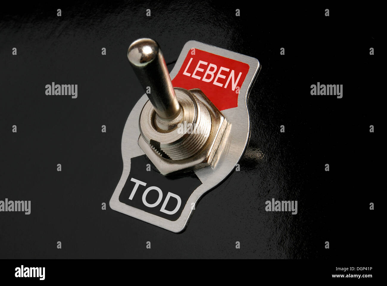 Toggle switch, labelled Leben and Tod, German for life and death, symbolic image Stock Photo