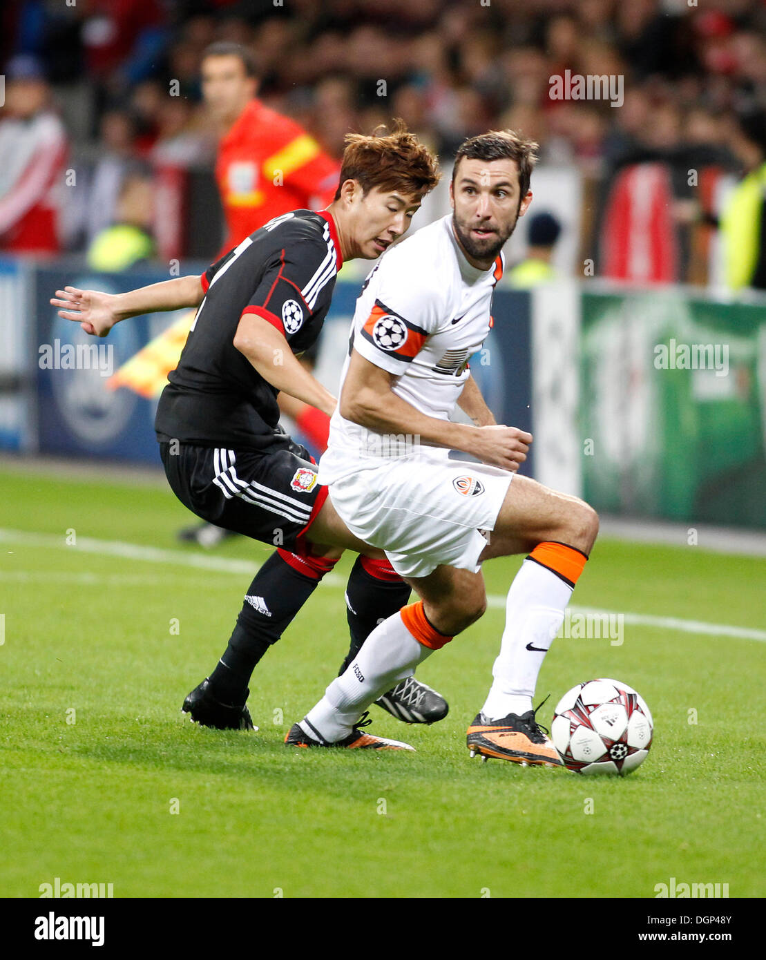 Leverkusen, Germany, 1st October, 2014. UEFA Champions League 2014/2015  Group stage Group C matchday 2, Bayer 04 Leverkusen (red) - Benfica  Lissabon (black) --- Heung-Min Son (Leverkusen) and Stefan Kie§ling  (Kiessling) (Leverkusen)