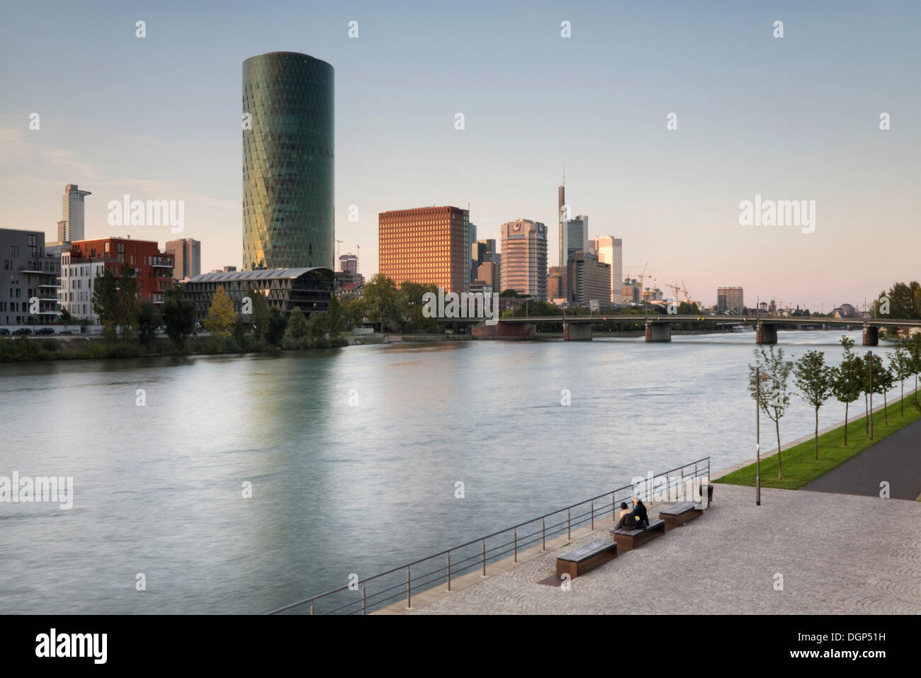 Young couple enjoying the evening atmosphere at the Main River, Westhafen, former Western Port, Frankfurt, Hesse Stock Photo
