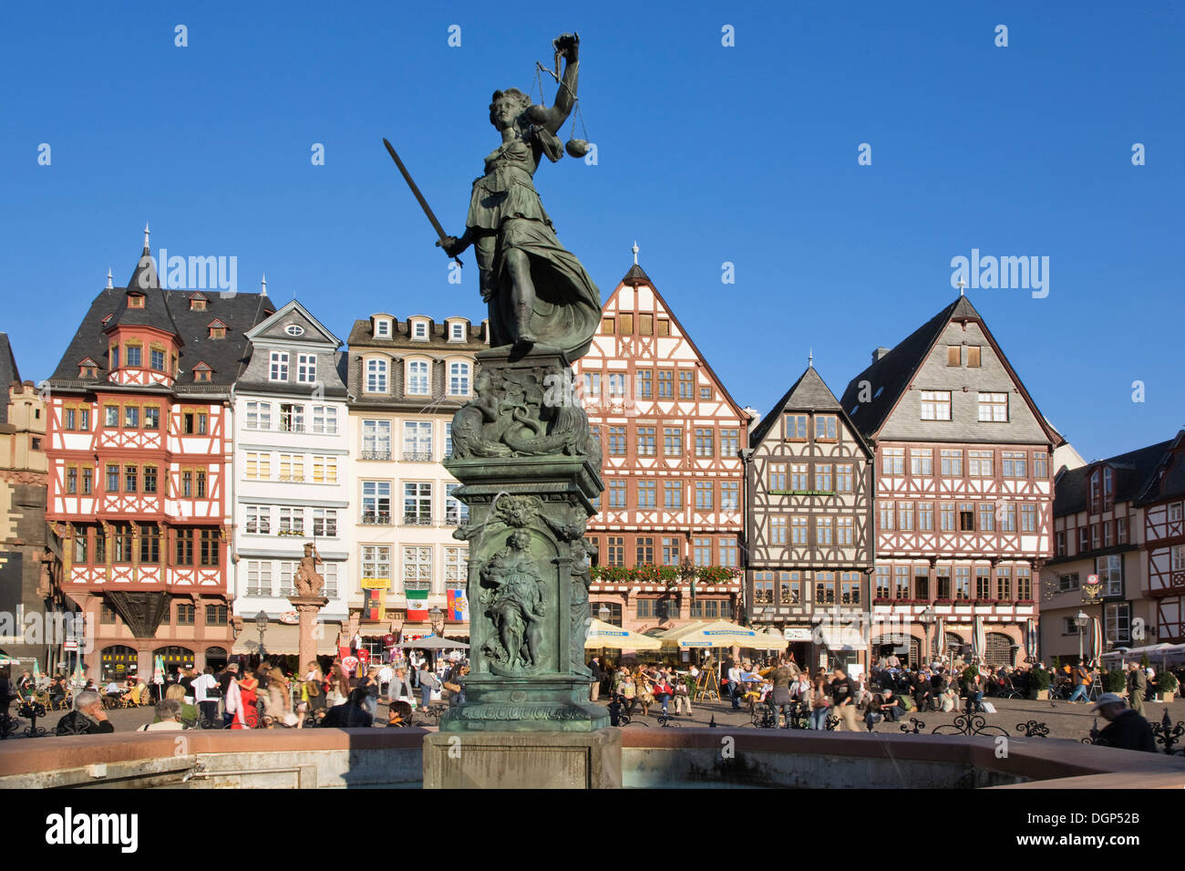 Half-timbered building ensemble on Roemerberg Square with the Justitia Fountain, Frankfurt, Hesse Stock Photo