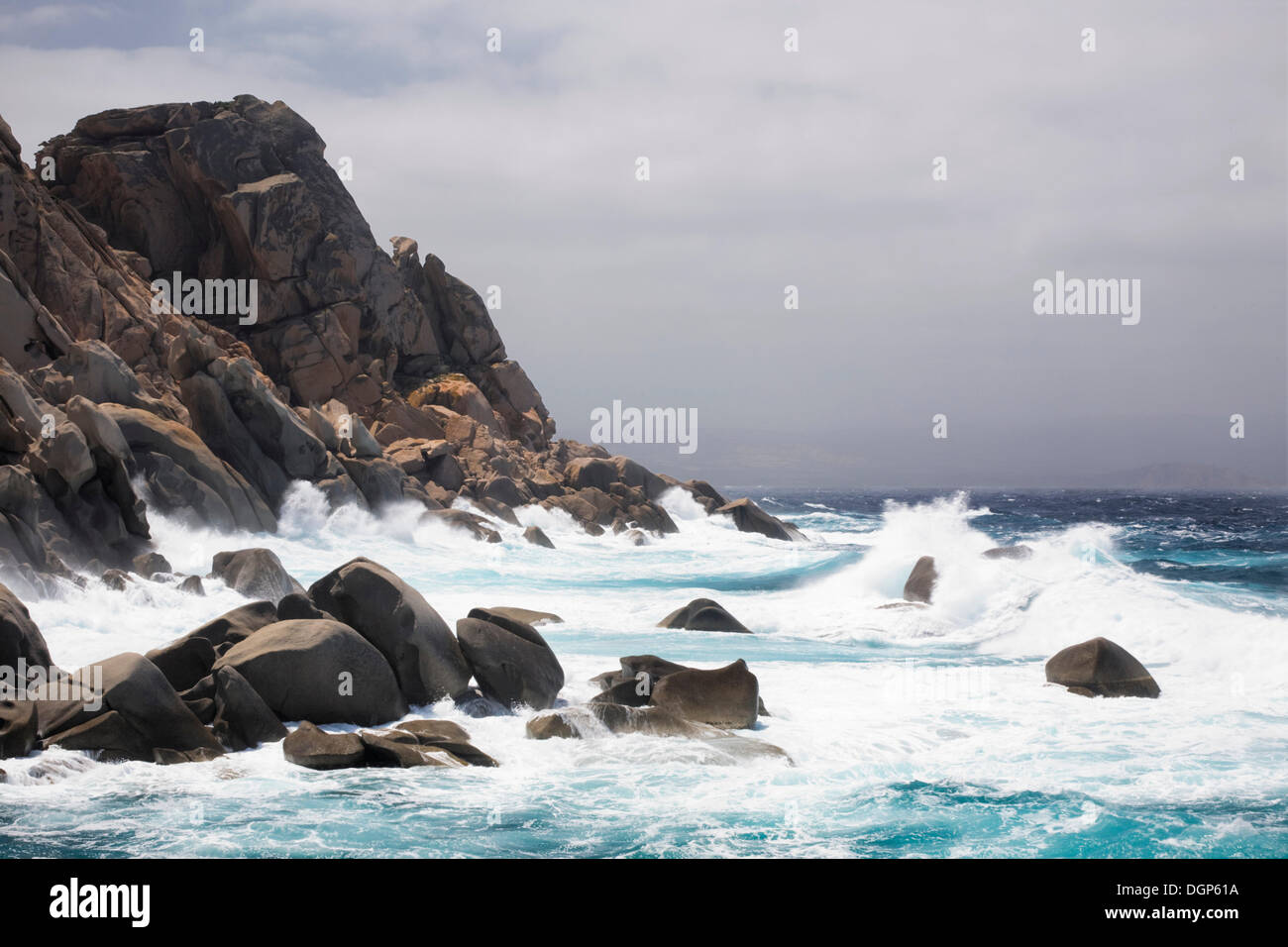 Waves breaking on the rocky coast near Valle di Luna, Sardinia, Italy, Europe Stock Photo