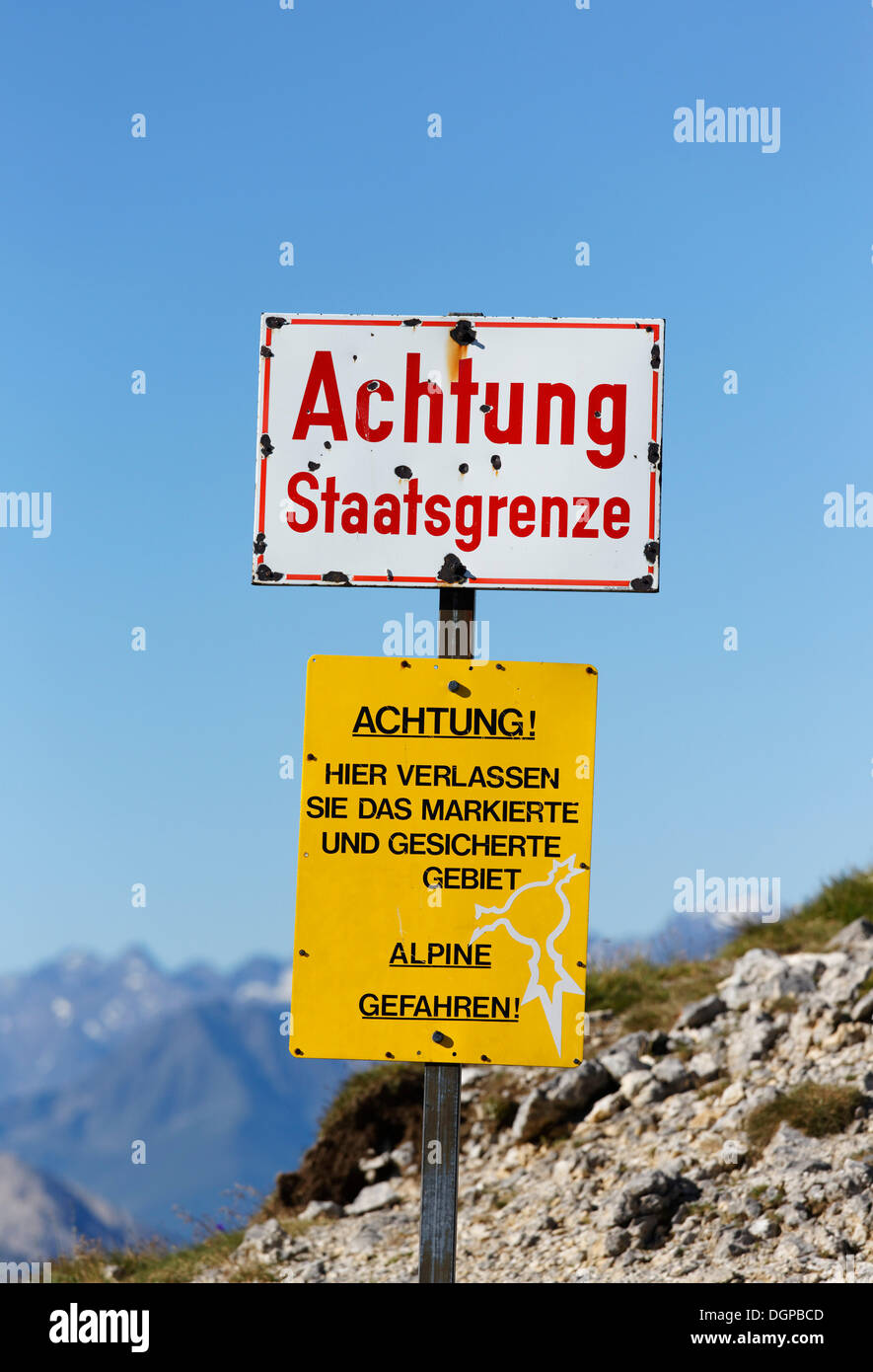 Sign, lettering 'Achtung Staatsgrenze', German for 'Attention, state border', Passamani, Mittenwald, Karwendel Mountains Stock Photo
