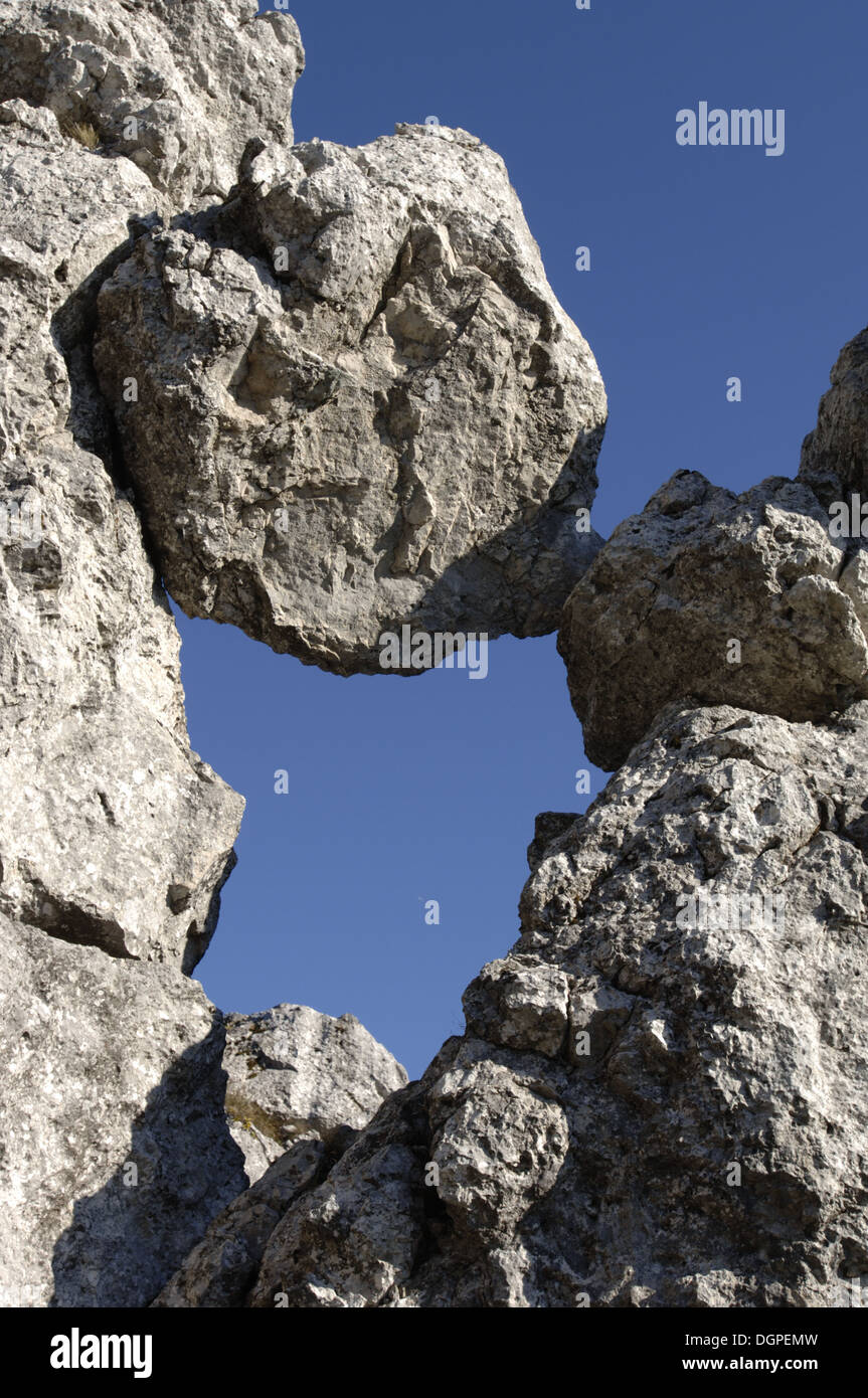 risk with stones at mountains Stock Photo