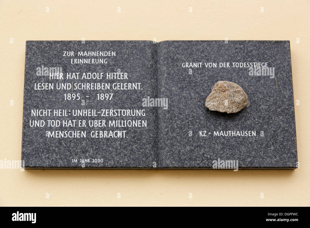 Memorial plaque, in remembrance of the crimes of Adolf Hitler, Fischlham, Hausruckviertel region, Upper Austria, Austria, Europe Stock Photo