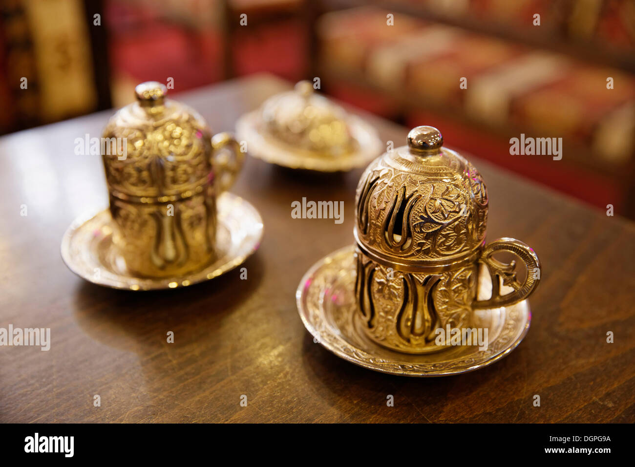 Mocha, Turkish coffee in traditional golden cups, Old City Sultanahmet, Istanbul, Turkey, Europe Stock Photo