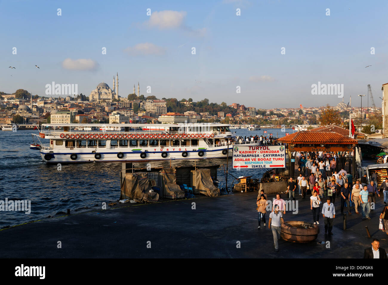Ferry terminal in Karakoey, Golden Horn, the Sueleymaniye Mosque at the back, Istanbul, european side, Turkey, Europe Stock Photo