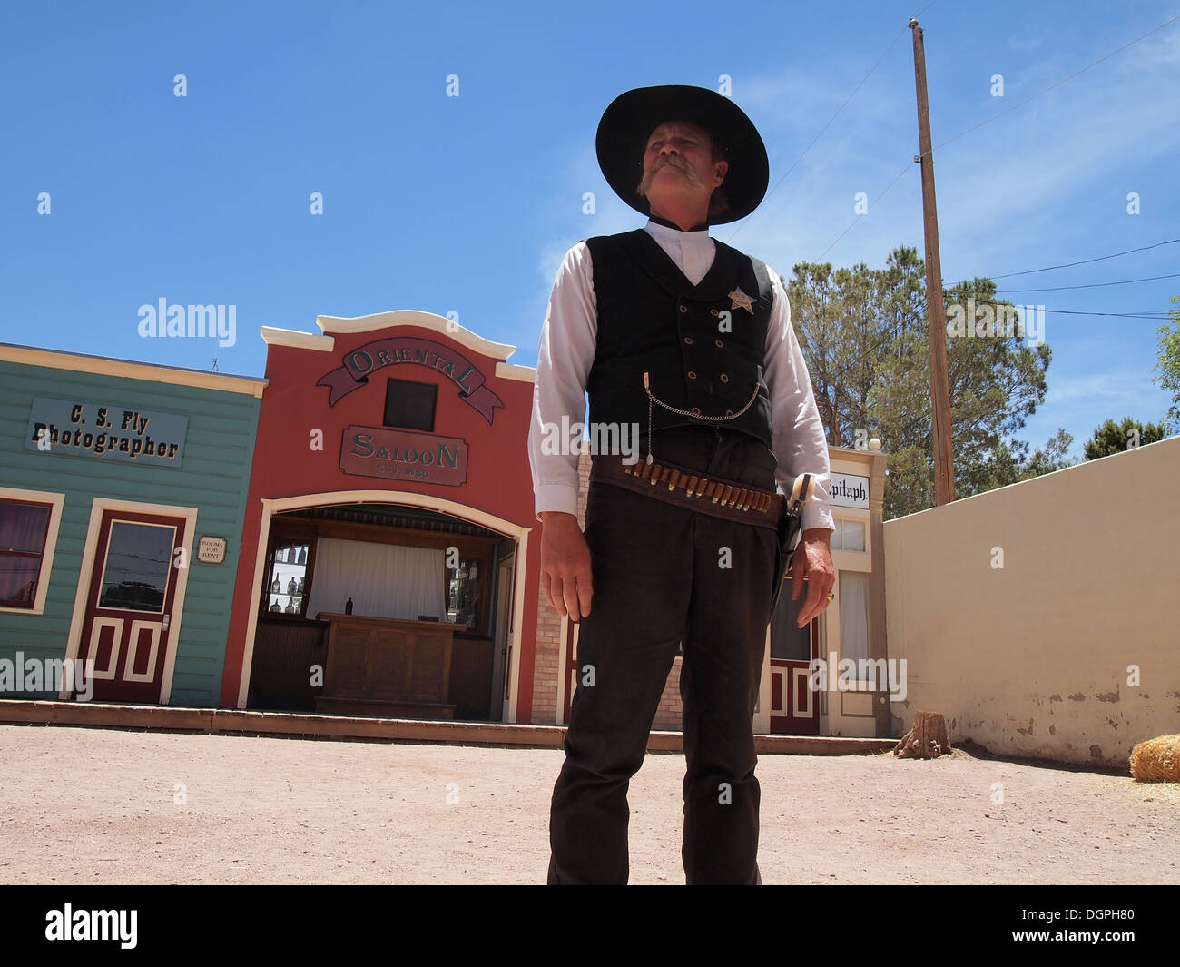 Various characters (Wyatt Earp pictured here) and theatrical sets recreate the American Old West in Tombstone, Arizona, USA Stock Photo