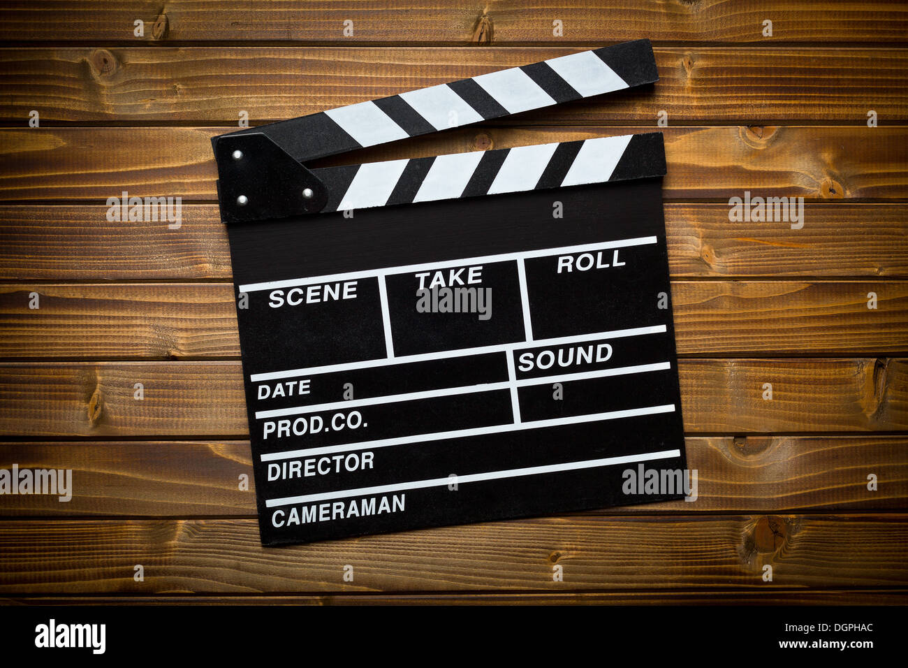 top view of clapper board on wooden table Stock Photo