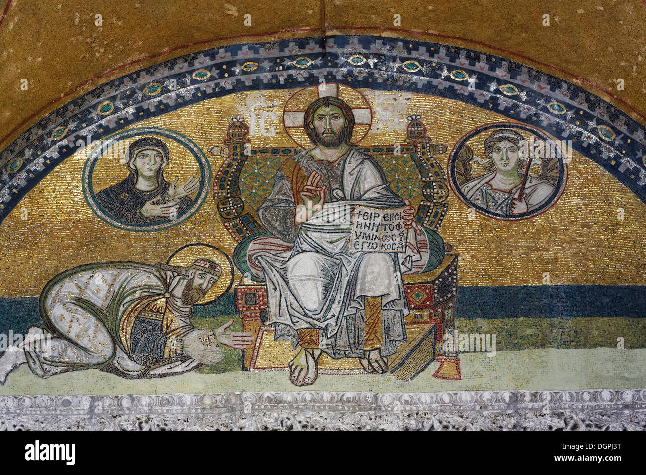 Byzantine mosaic of Jesus on a throne with the kneeling Emperor Leo VI in the narthex, Hagia Sophia, Sultanahmet, Istanbul Stock Photo