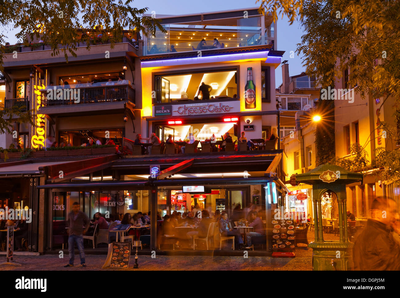 Illuminated restaurants in the evening, Ortaköy, Besiktas, Istanbul, Istanbul Province, Turkey Stock Photo