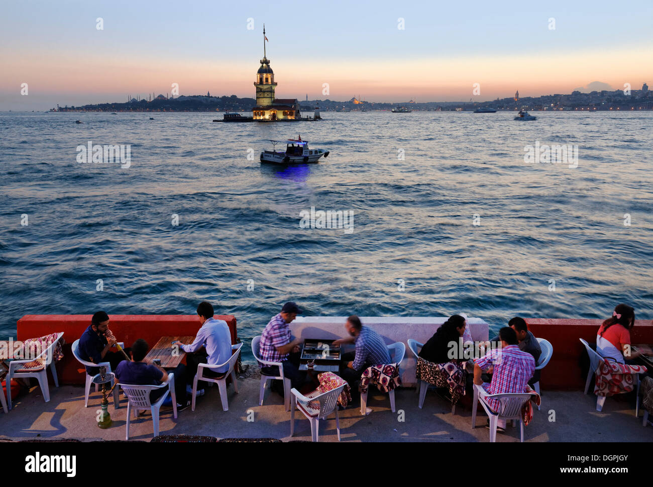 Evening mood, cafe on the Bosphorus, Maiden's Tower or Leander's Tower, Kız Kulesi, Bosporus, Üsküdar, Istanbul Stock Photo