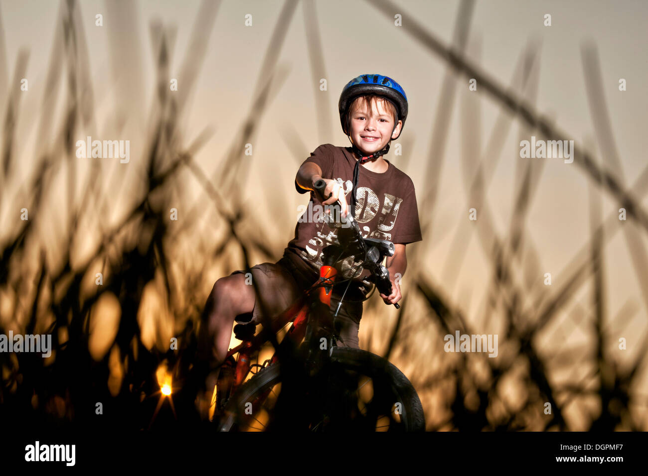 Boy riding a mountain bike Stock Photo