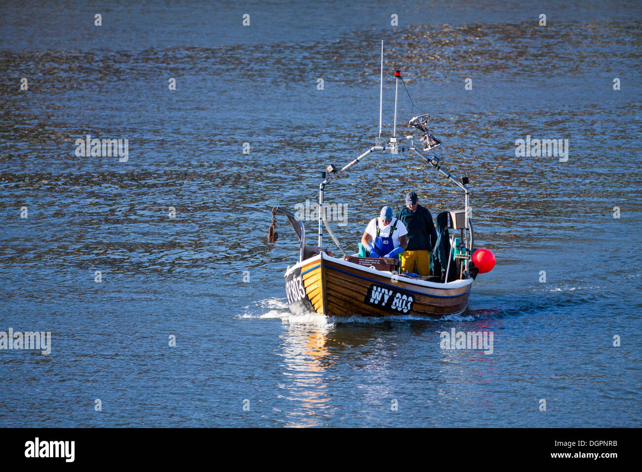 Whitby harbour fishing boat hi-res stock photography and images - Alamy