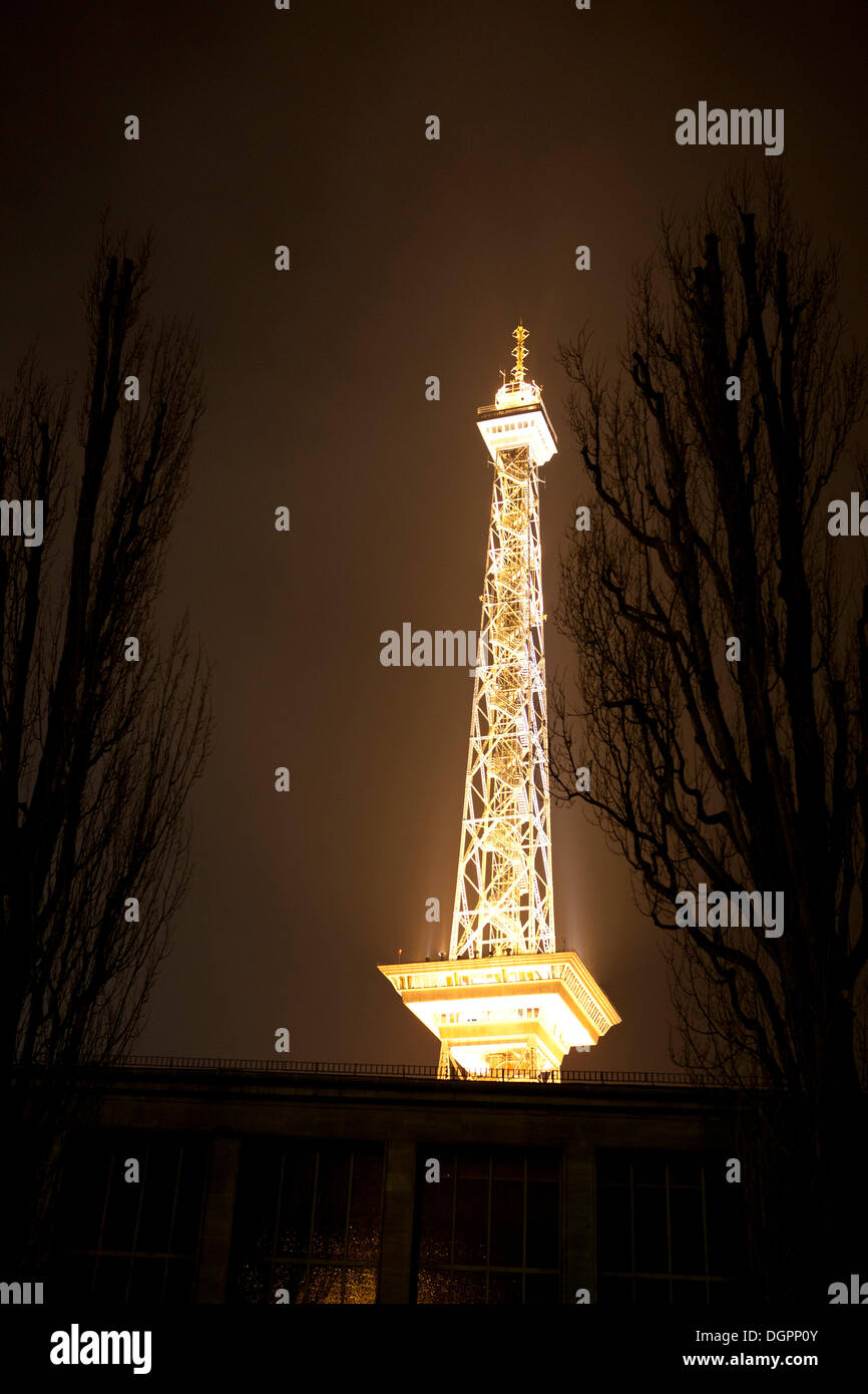 View towards the illuminated Funkturm Berlin radio tower at night, Berlin Stock Photo