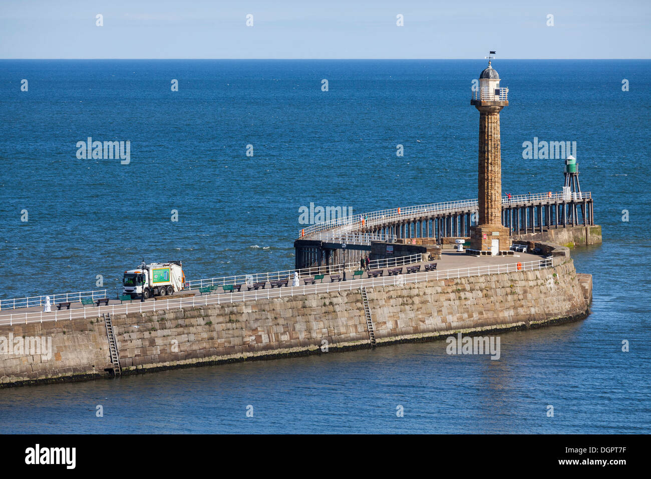 Refuse vehicle on the West pier at Whitby, North Yorkshire. Stock Photo