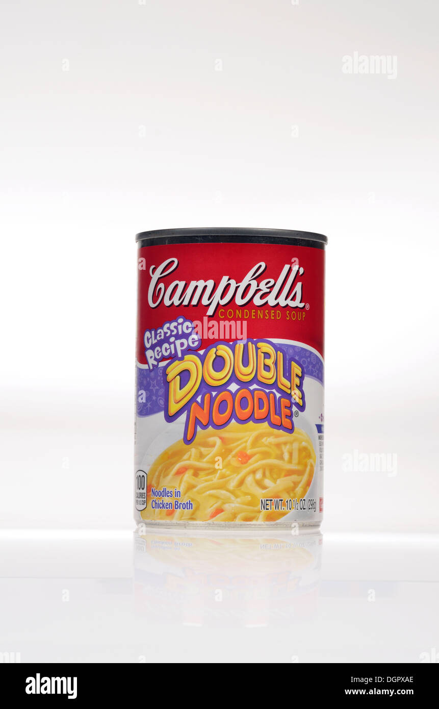 Unopened tin of Campbell's double noodle soup on white background, isolated. Stock Photo
