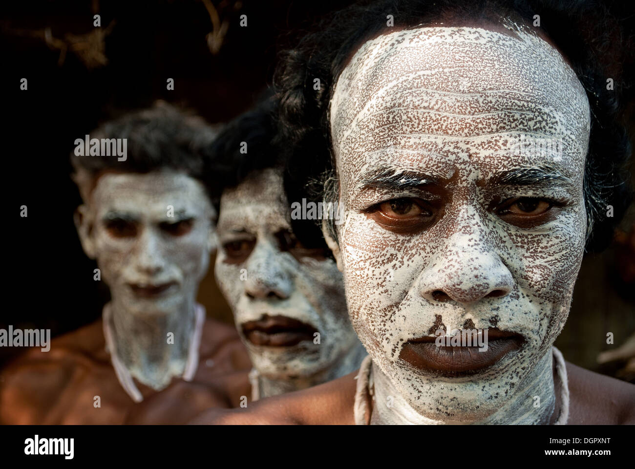 Men painted their face during Gajan festival in West Bengal,India. Stock Photo