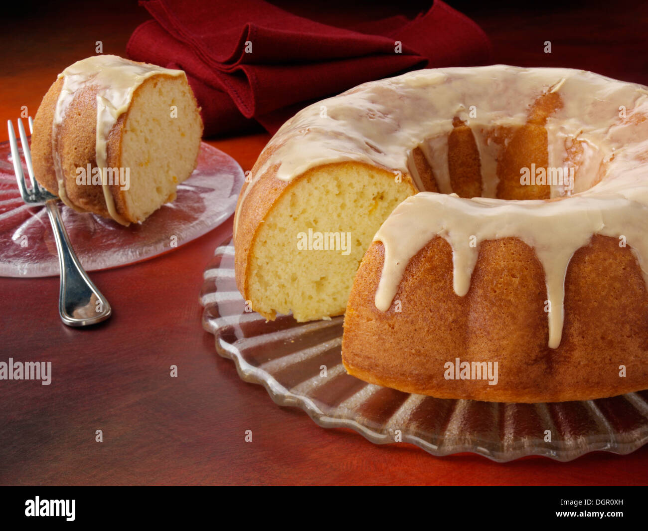 Glazed orange bundt cake Stock Photo Alamy