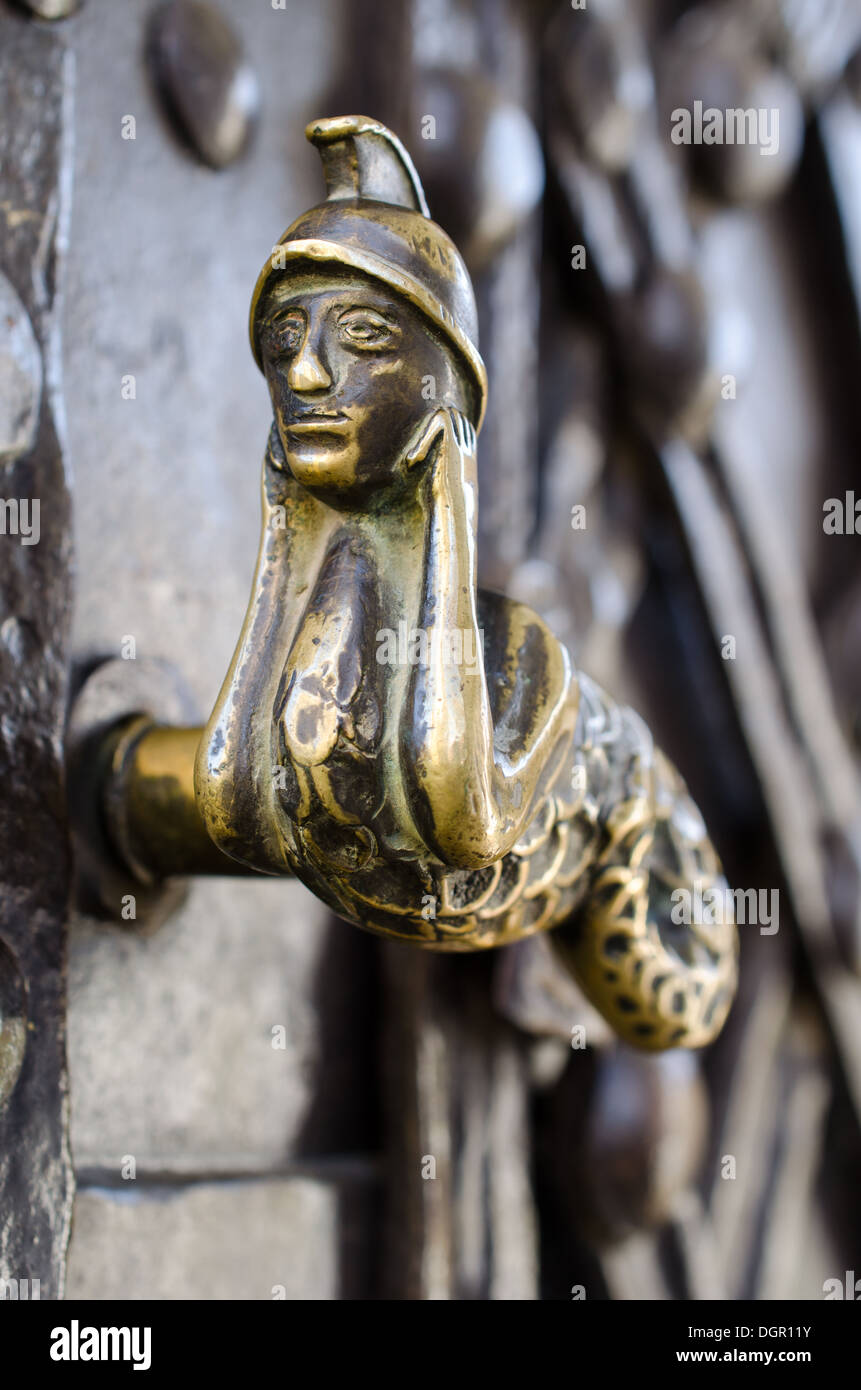 Old decorative handle, at a medieval door, in Cisnadie, Romania Stock Photo