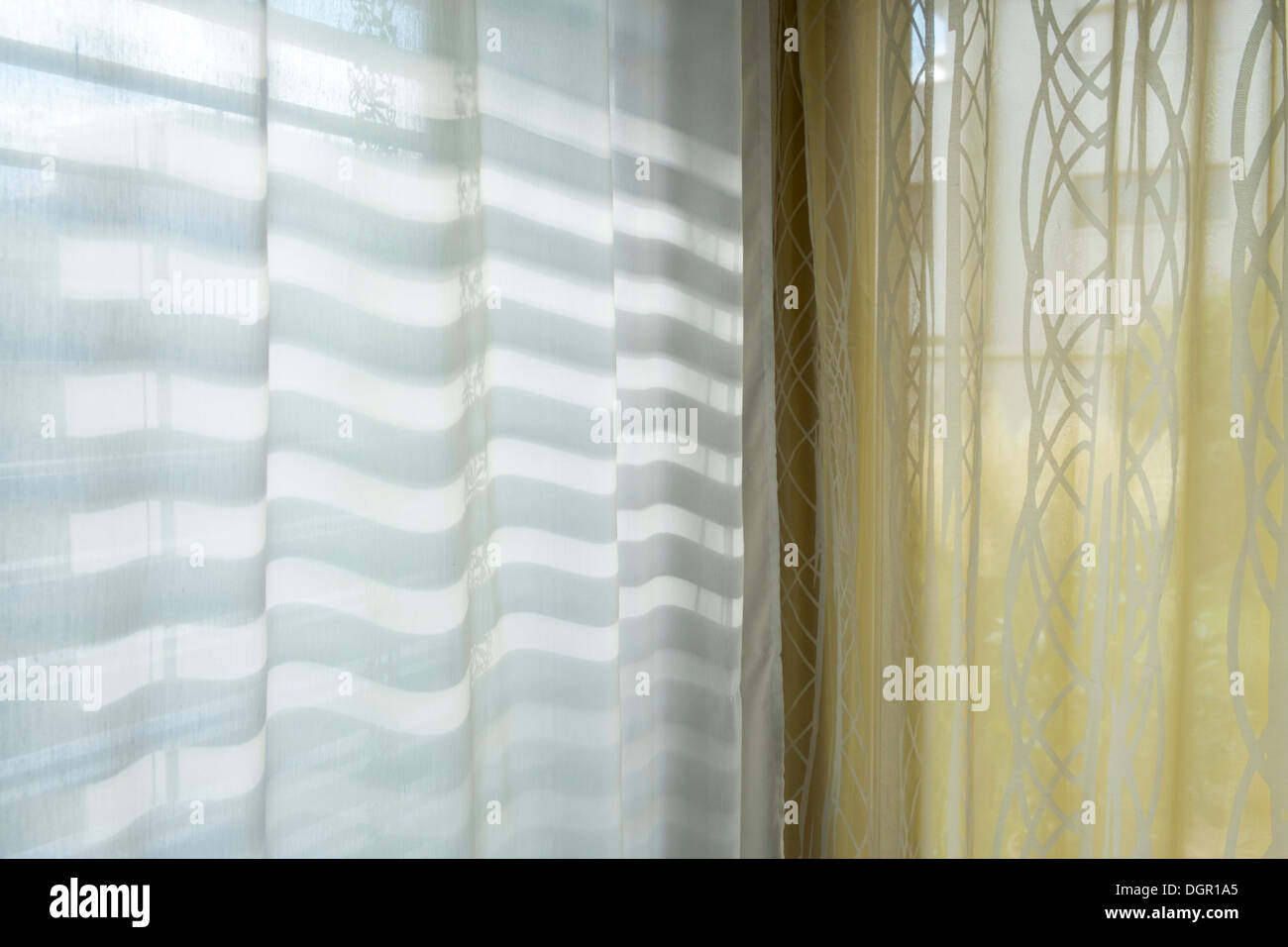 Louvers shadows and curtains Stock Photo