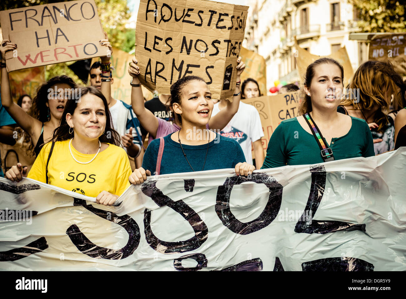 Barcelona, Spain. October 24th, 2013: Students behind their banner protest against austerity measures and the 'law Wert' during a three day long education strike in Barcelona. © matthi/Alamy Live News Stock Photo
