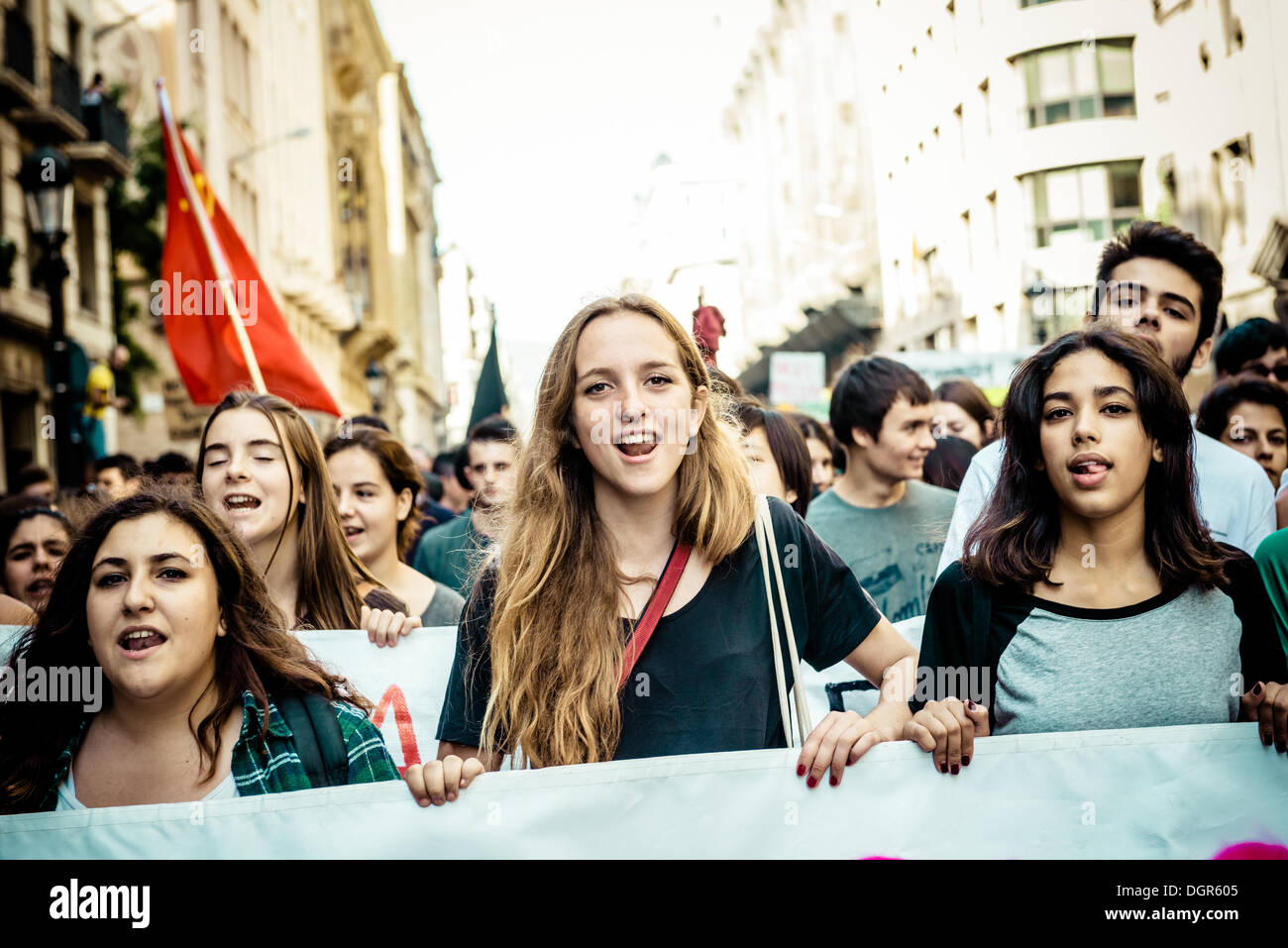 Barcelona, Spain. October 24th, 2013: Students behind their banner shout slogans to protest austerity measures and the 'law Wert' during a three day long education strike in Barcelona. © matthi/Alamy Live News Stock Photo