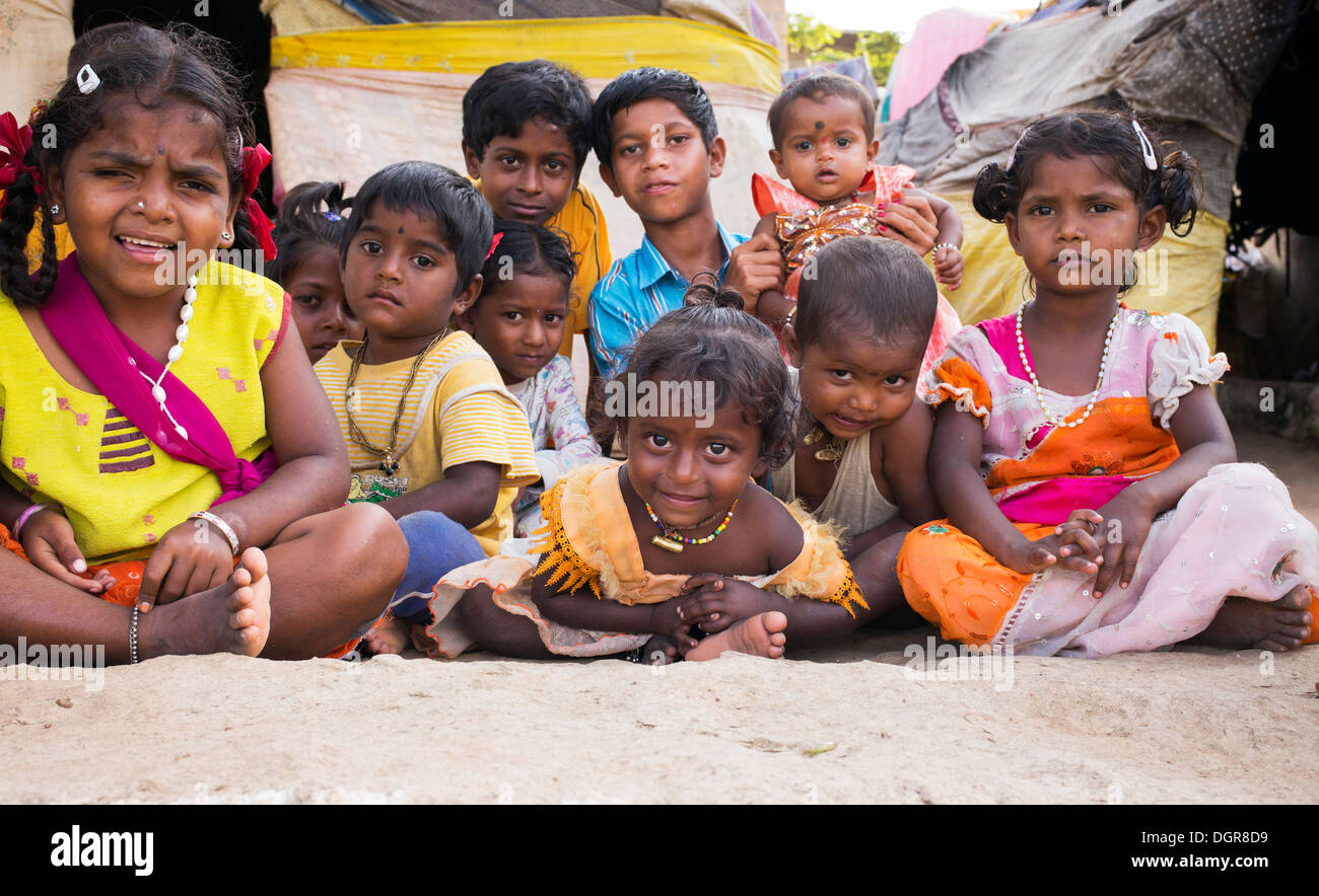 Indian lower caste children outside their bender / tent / shelter.  Andhra Pradesh, India. Stock Photo
