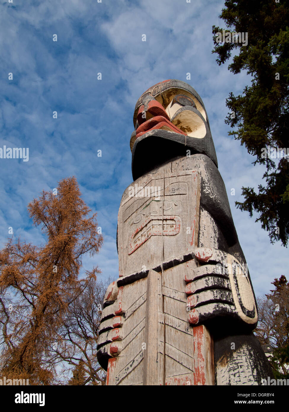 A Kwaikiutl Totem Pole on the Alberta Legislature Grounds in Edmonton, Alberta, Canada. Stock Photo