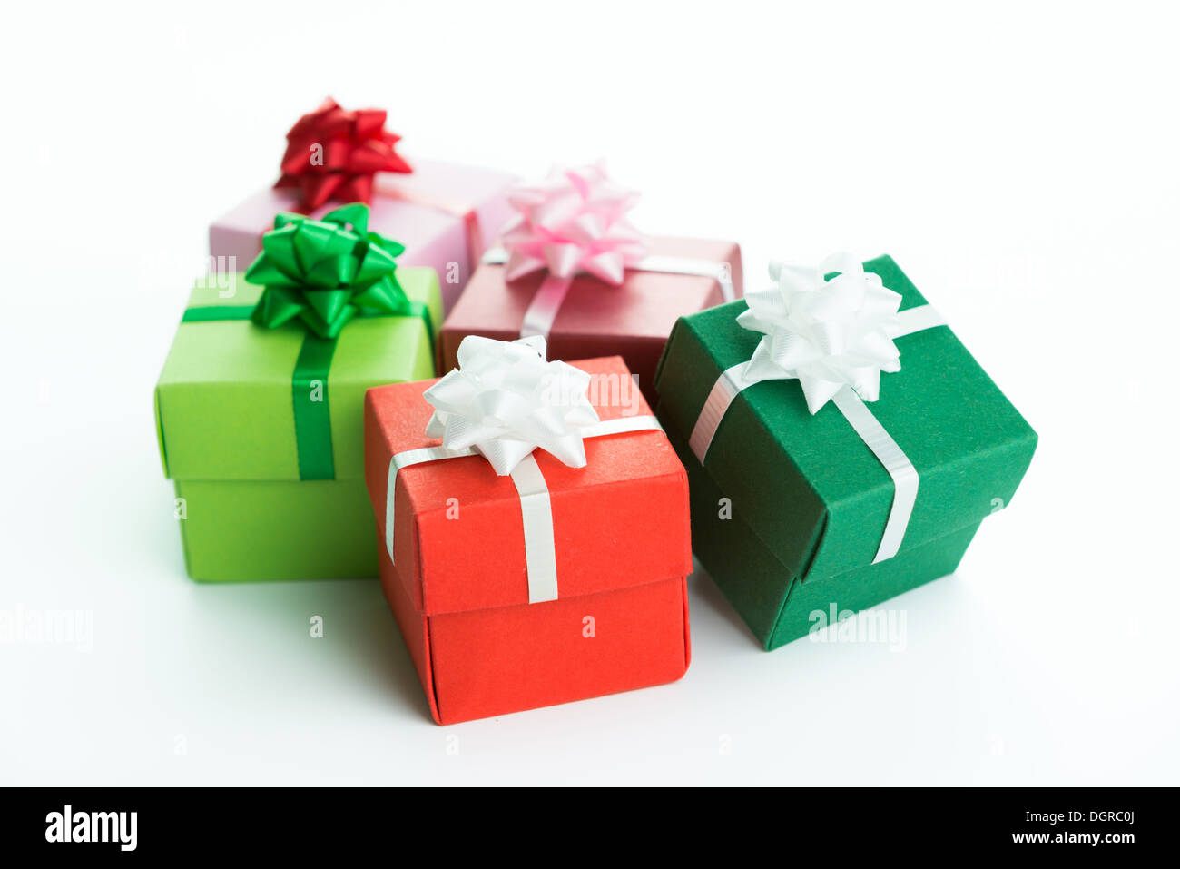 Various colour gift boxes wrapped with ribbons and bow Stock Photo